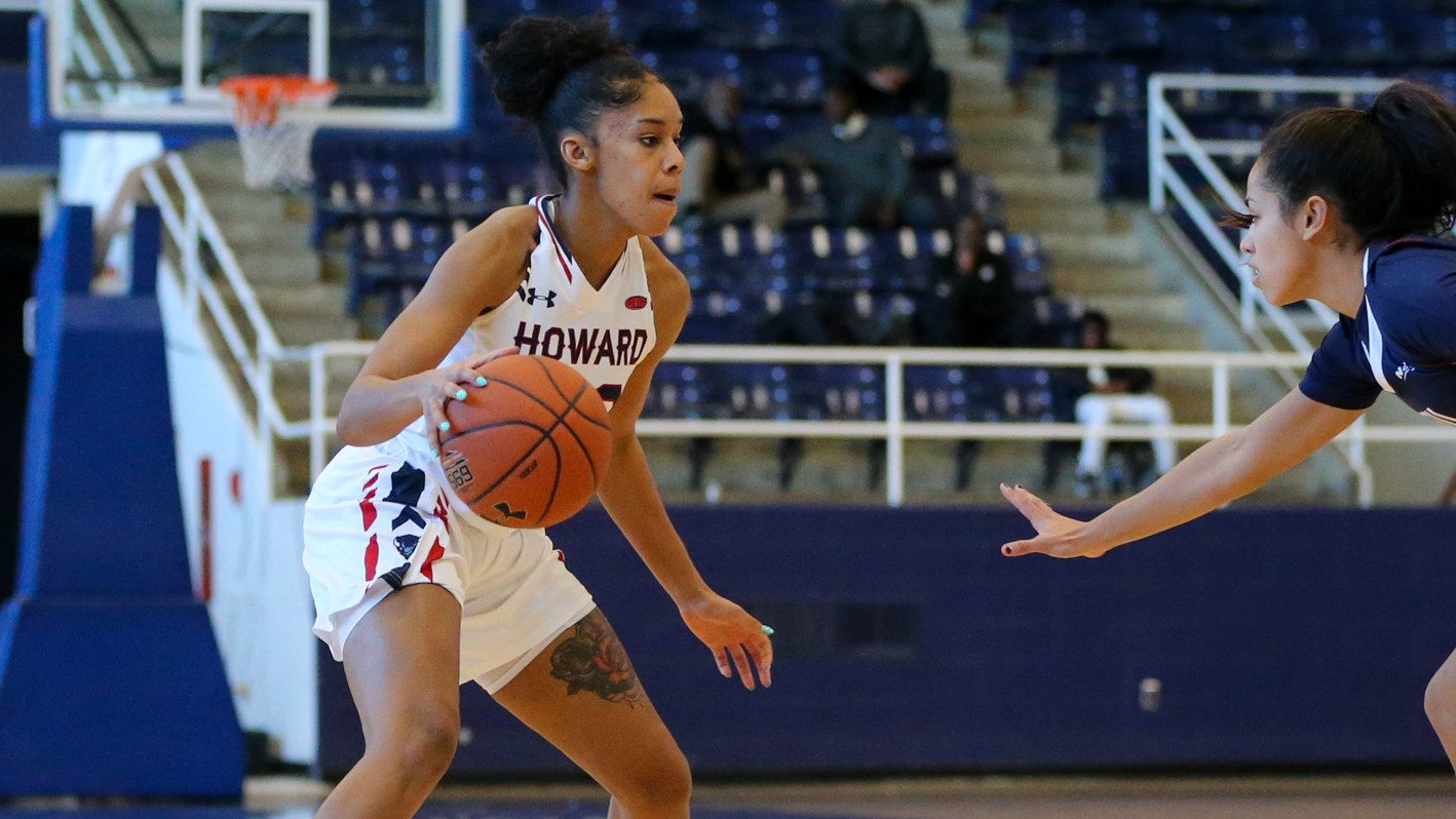 Howard Senior Jayla "JT3" Thornton Looking for room to operate while dropping a career high 29 points against Richmond(Photo Credit – Rodney Pierce)