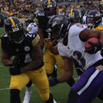 Steelers RB Benny Snell prepares to make a special teams tackle on WR Devin Duvernay