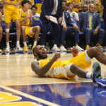 Jamarius Burton’s response after a foul by Isaiah Wong